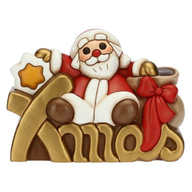 Immagine di Babbo Natale su scritta Xmas in ceramica